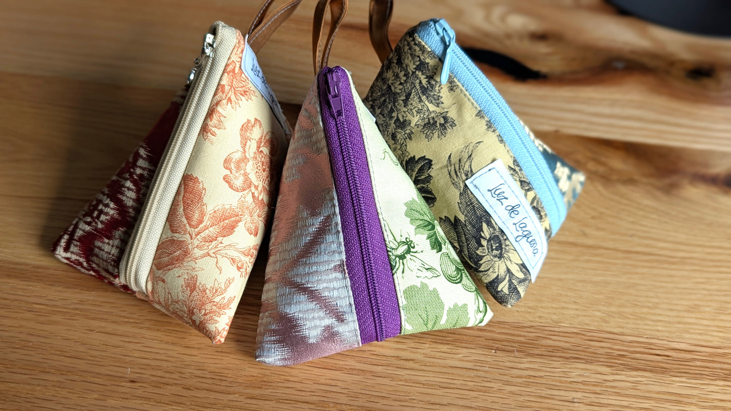 Upcycle upholstery triangle coin pouches