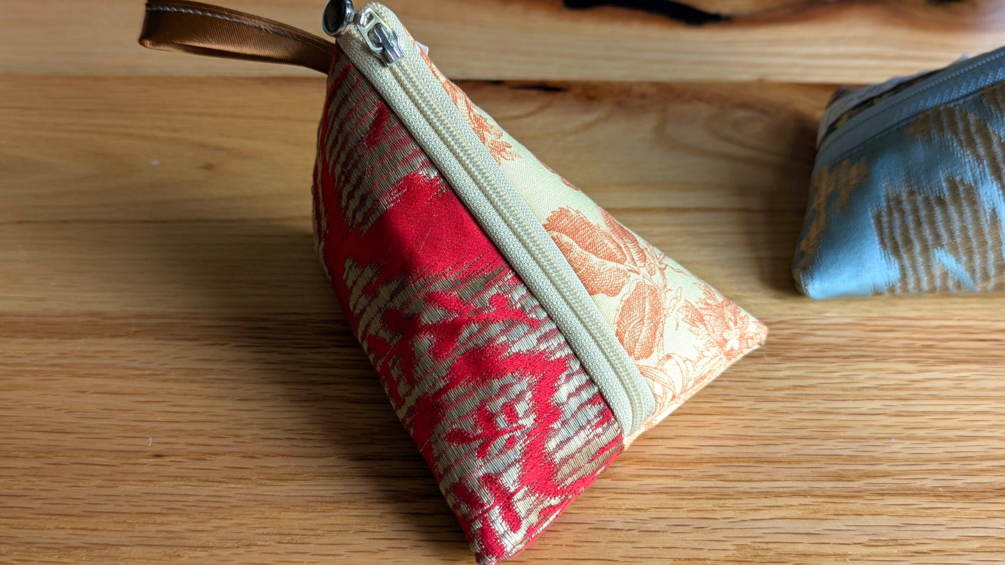 Upcycle upholstery triangle coin pouches