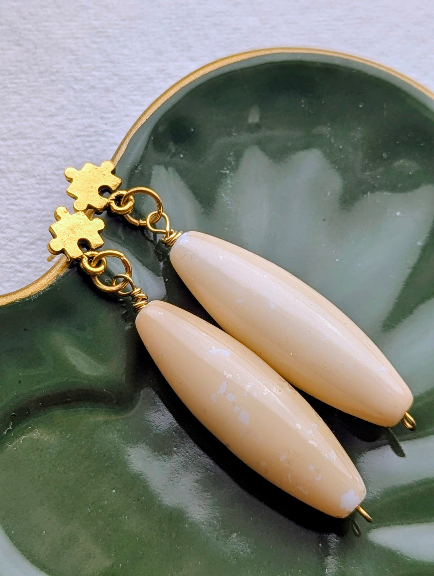 Gold Puzzle Piece & Cream Dangle Earrings