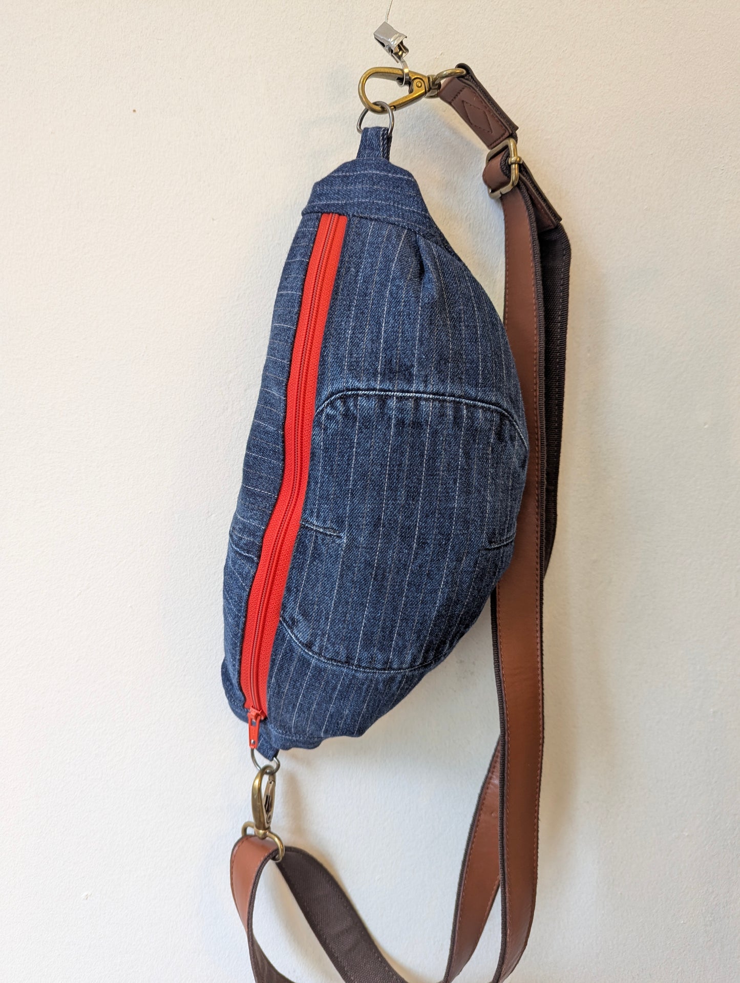 Denim Pinstripe Sling Bag with Red Zipper