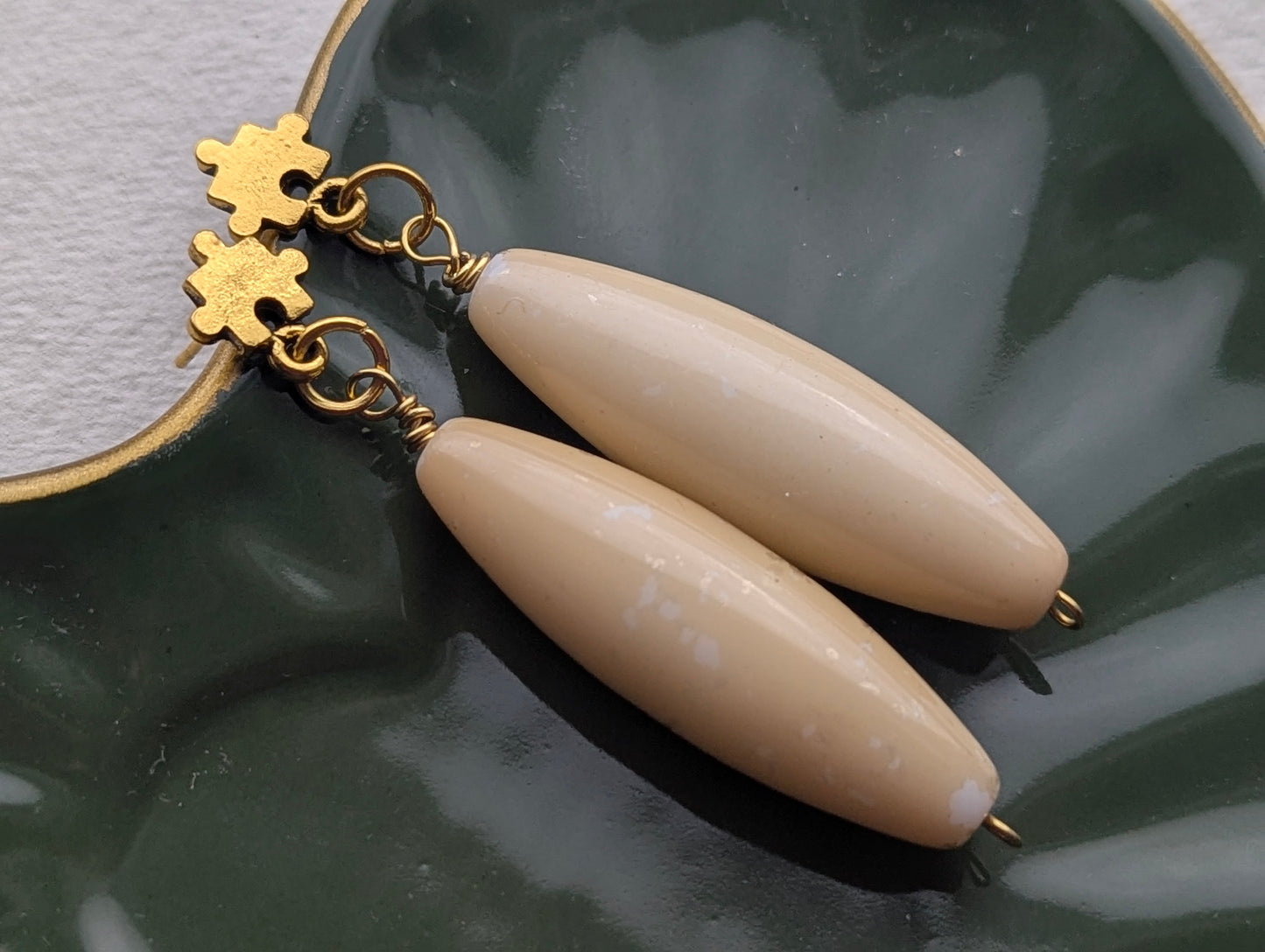 Gold Puzzle Piece & Cream Dangle Earrings