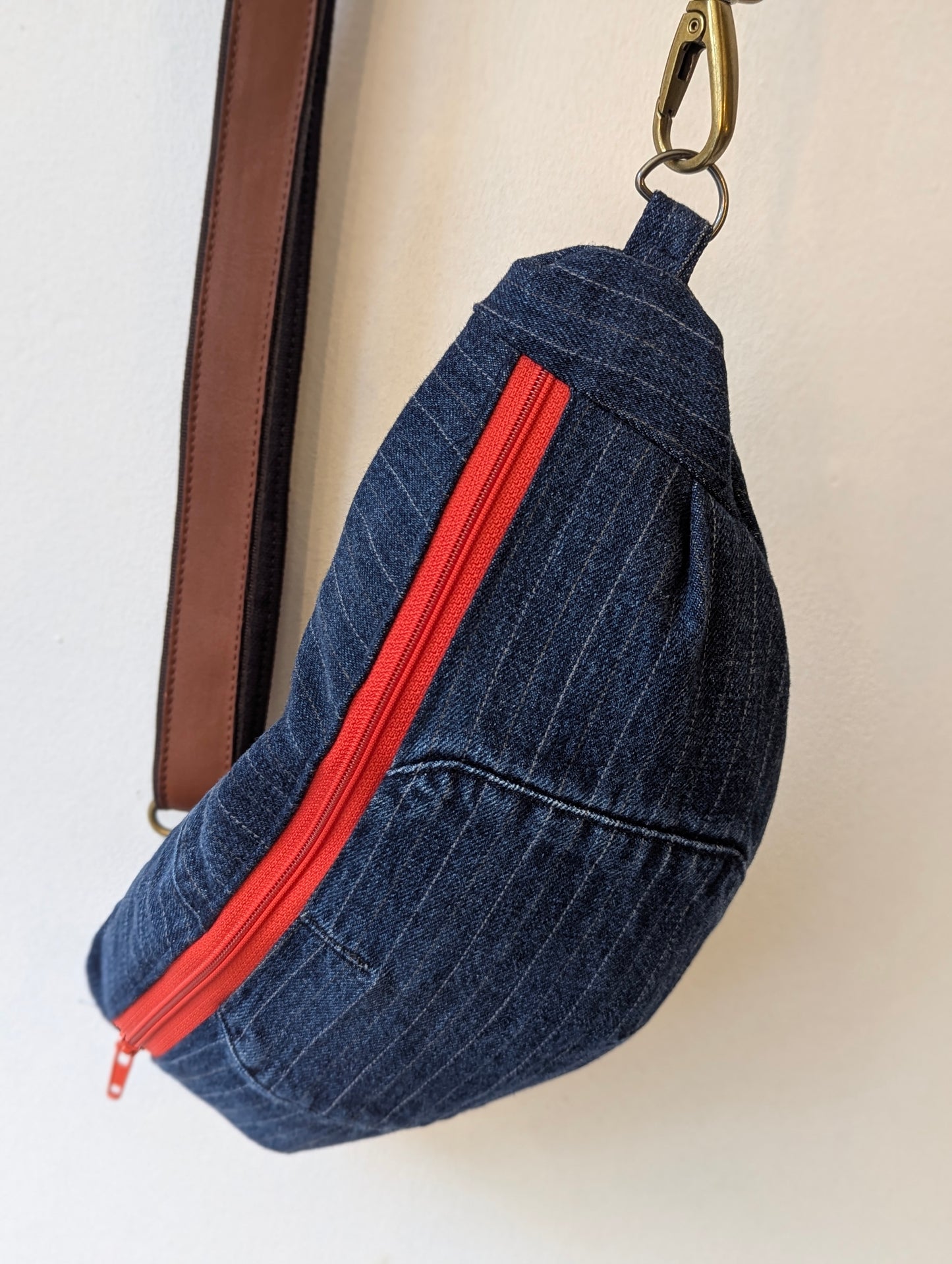 Denim Pinstripe Sling Bag with Red Zipper