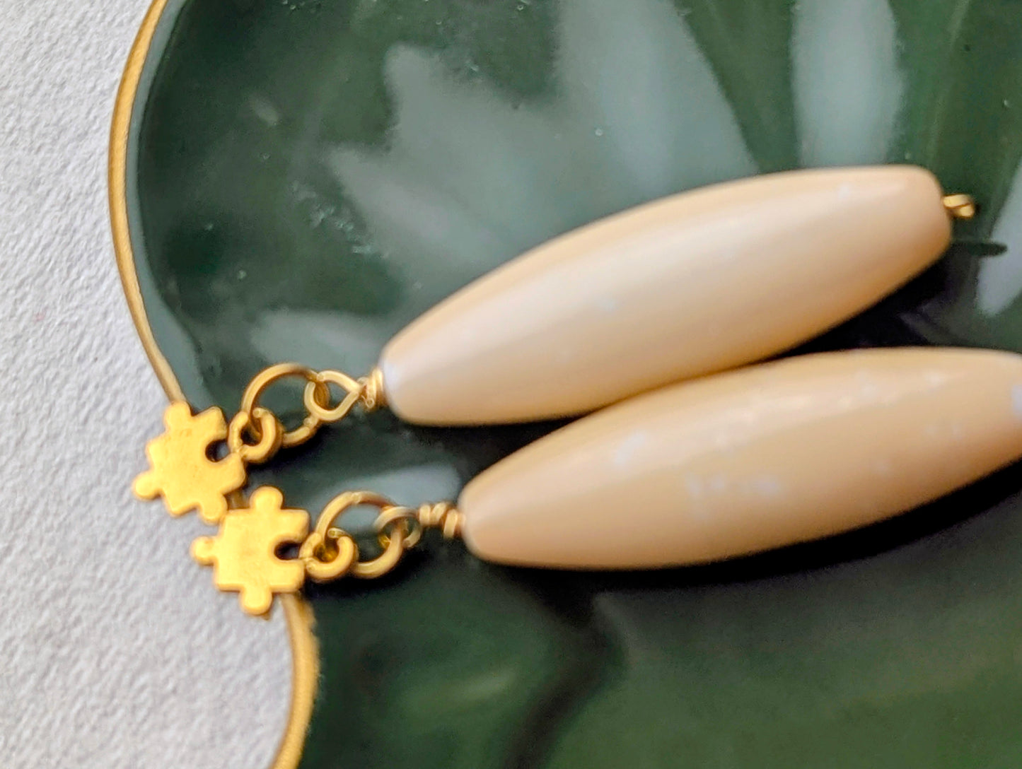 Gold Puzzle Piece & Cream Dangle Earrings