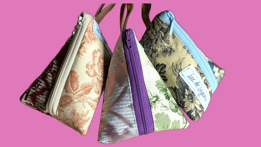 Upcycle upholstery triangle coin pouches