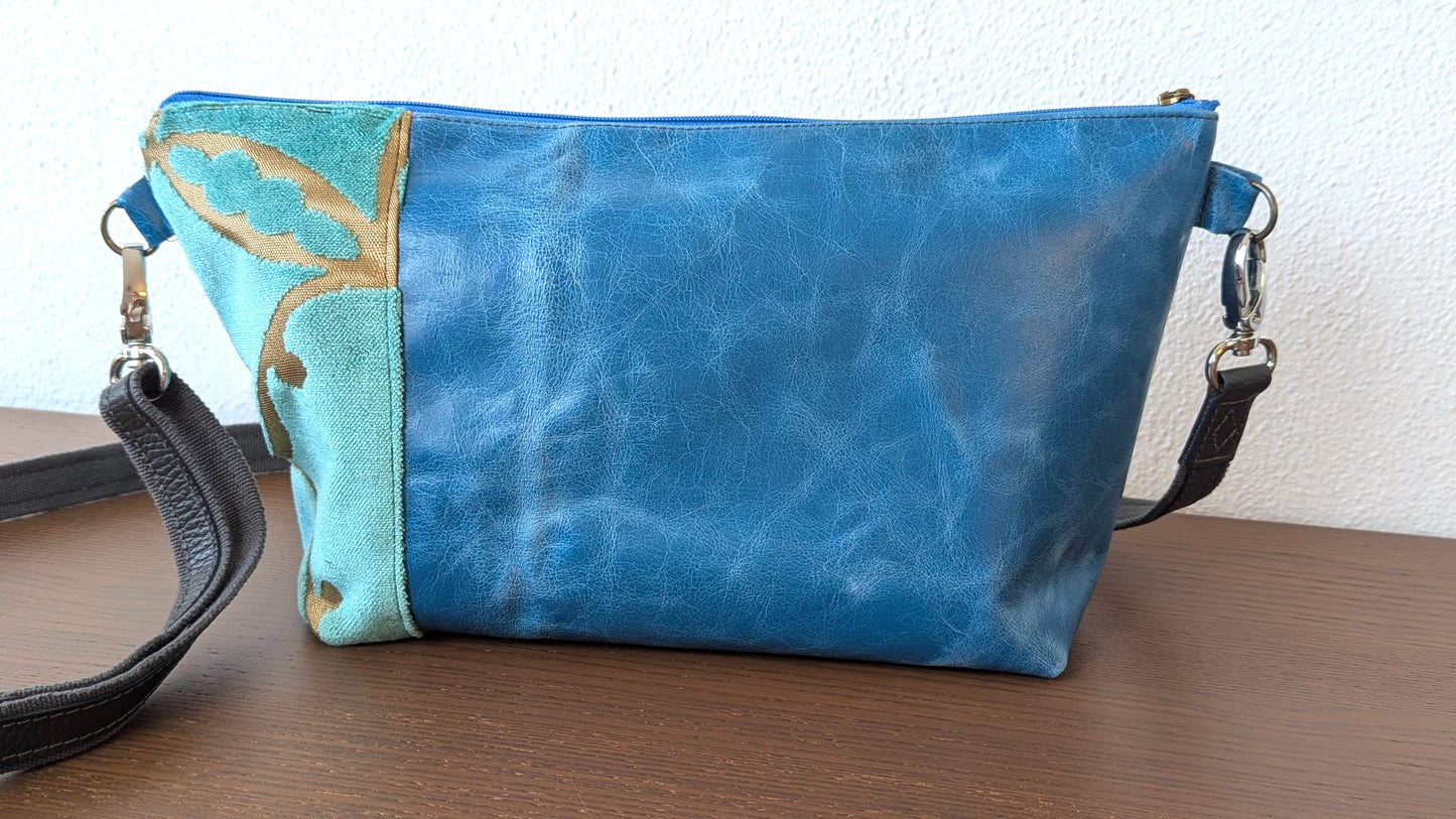 Upcycle textile in baby blue and blue leather bag