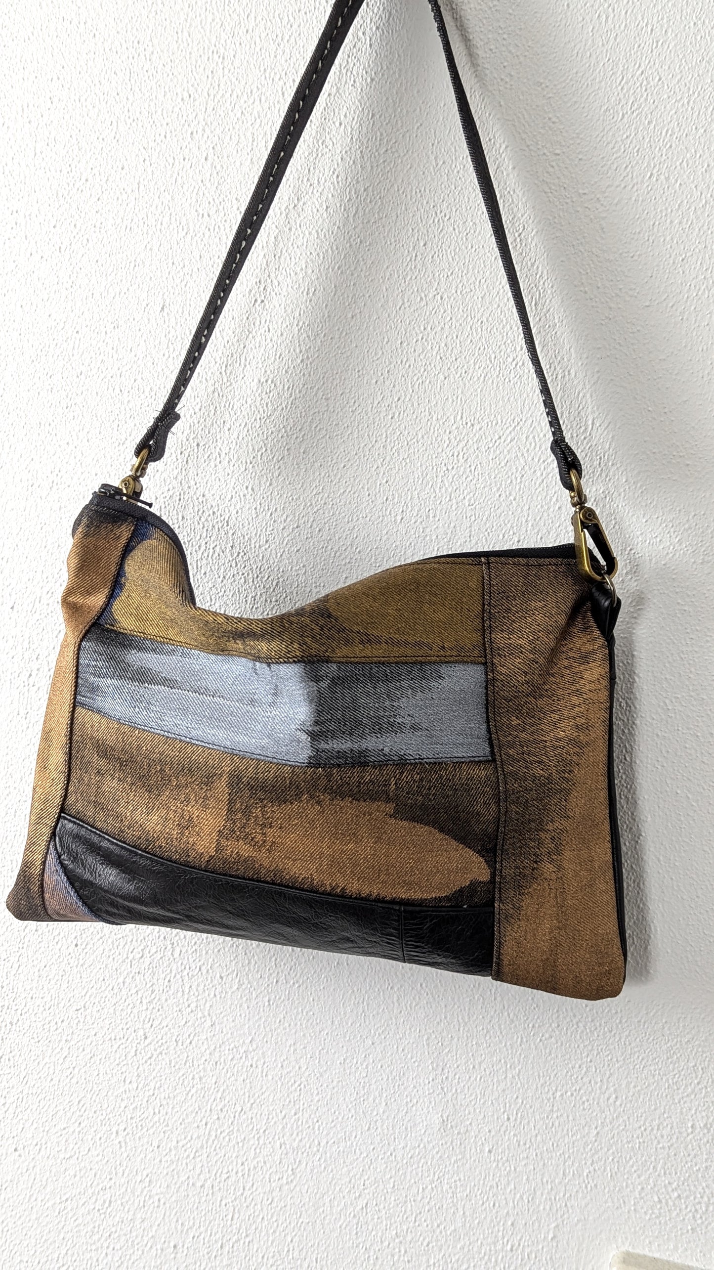 Painted denim and leather bag