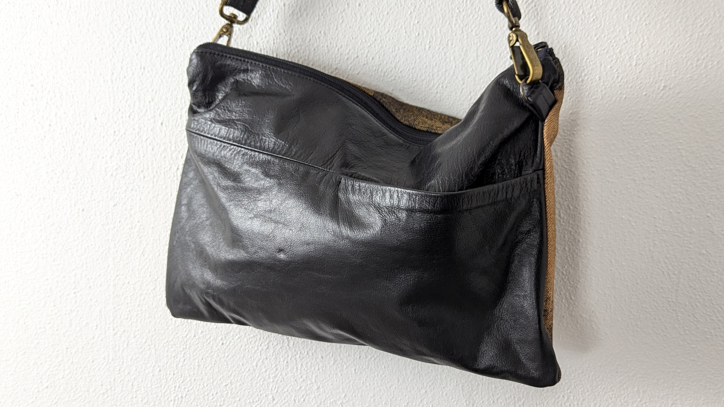 Painted denim and leather bag