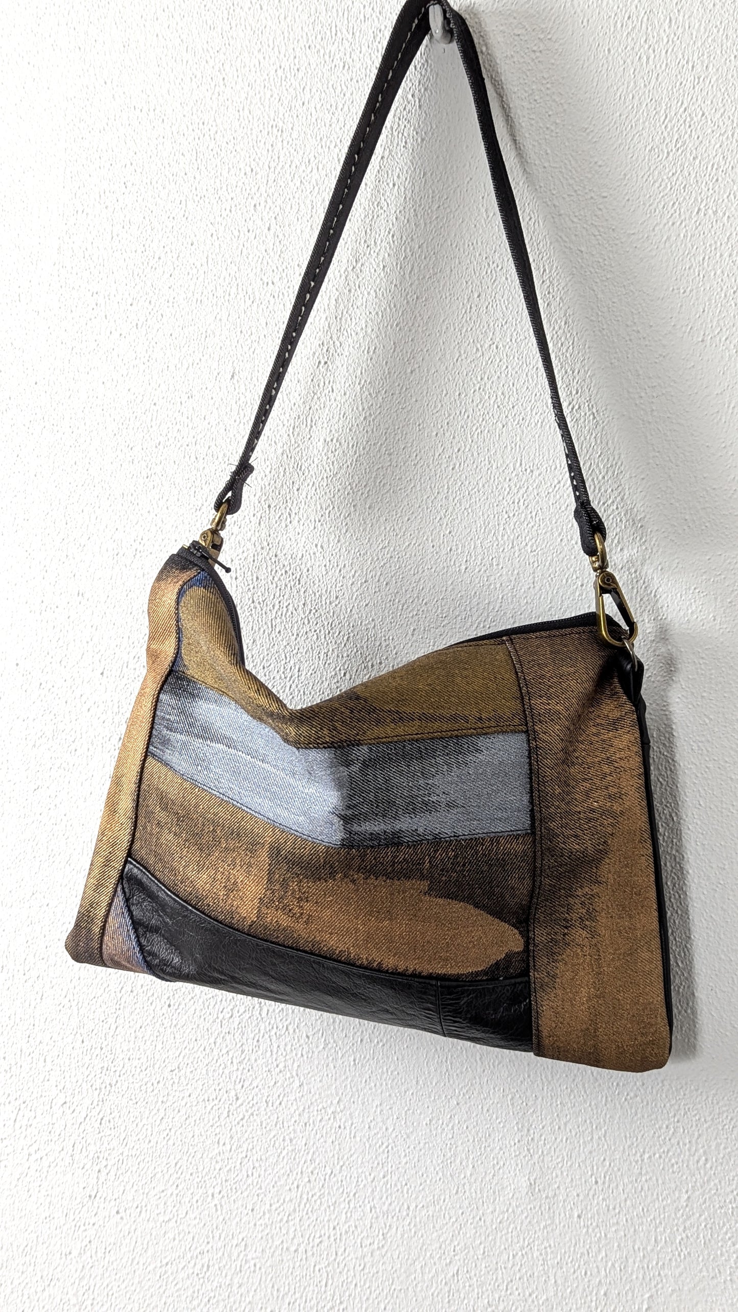 Painted denim and leather bag