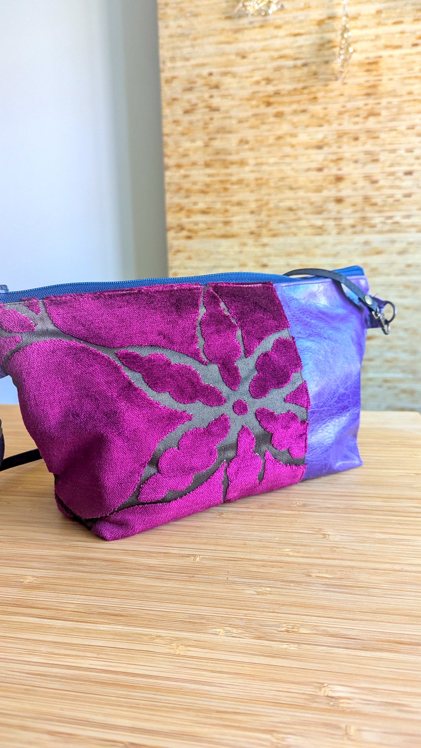 Upcycle textile and purple leather bag