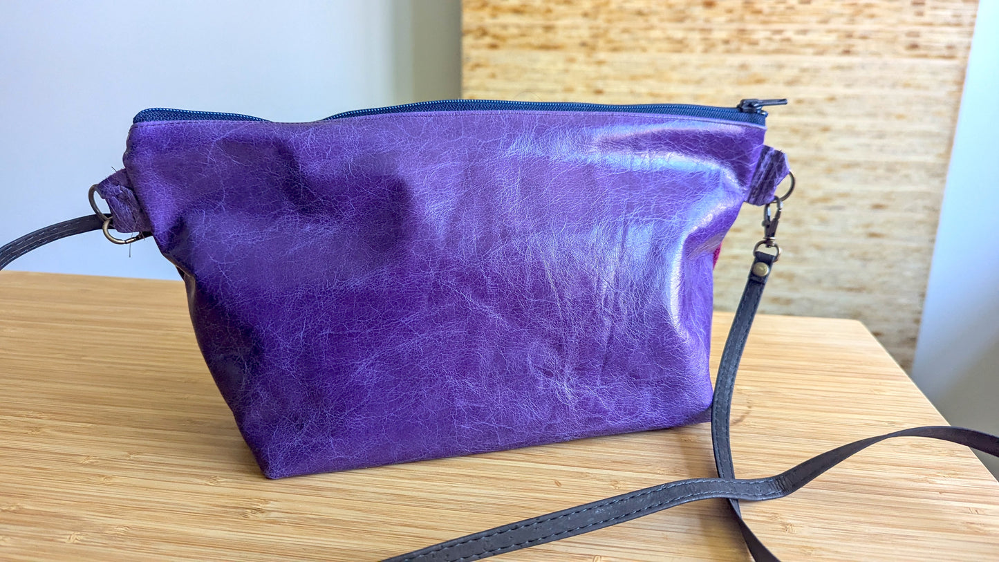 Upcycle textile and purple leather bag
