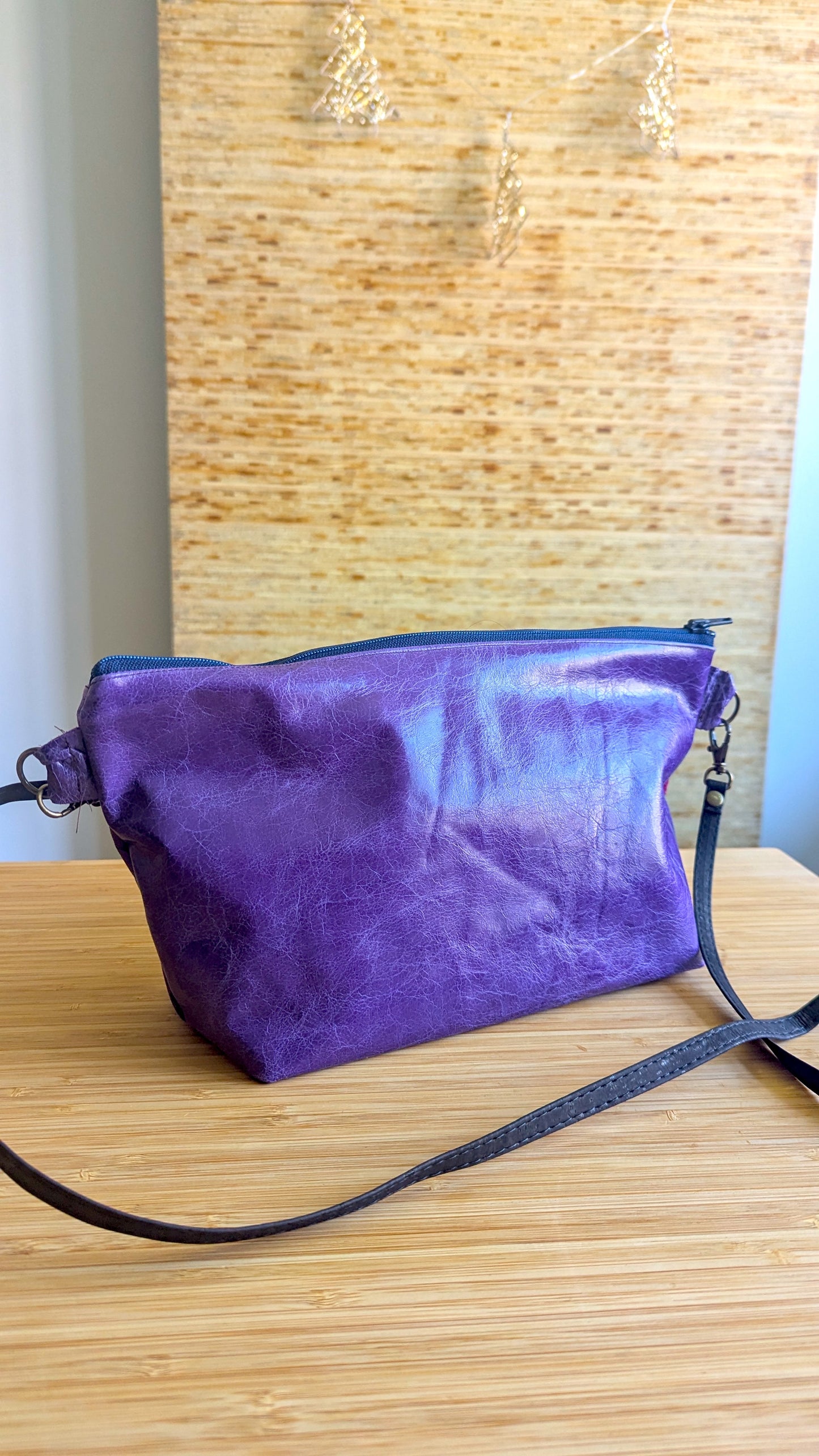 Upcycle textile and purple leather bag