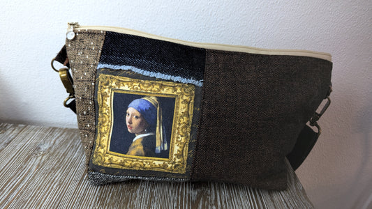 Girl with pearl wool bag